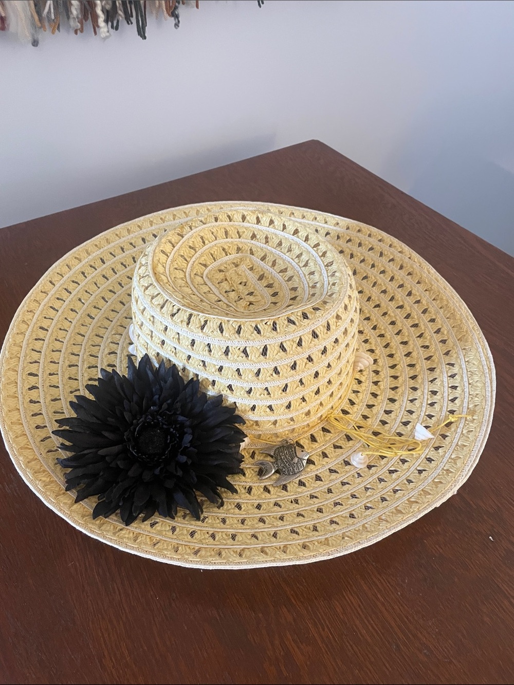 Straw Sun Hat with Black Flower Accent -
